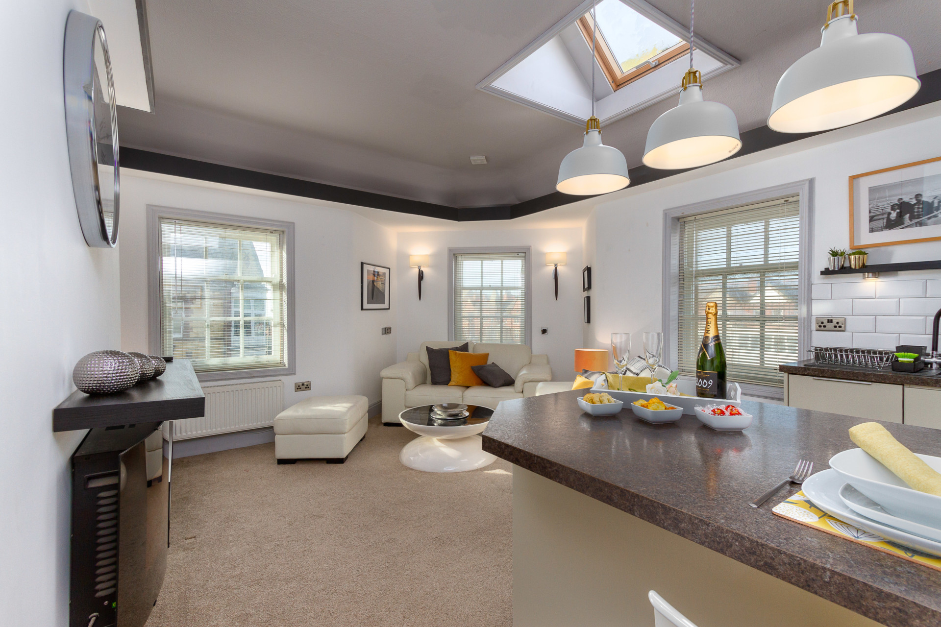 Open plan lounge and kitchen overlooking St Anne's square